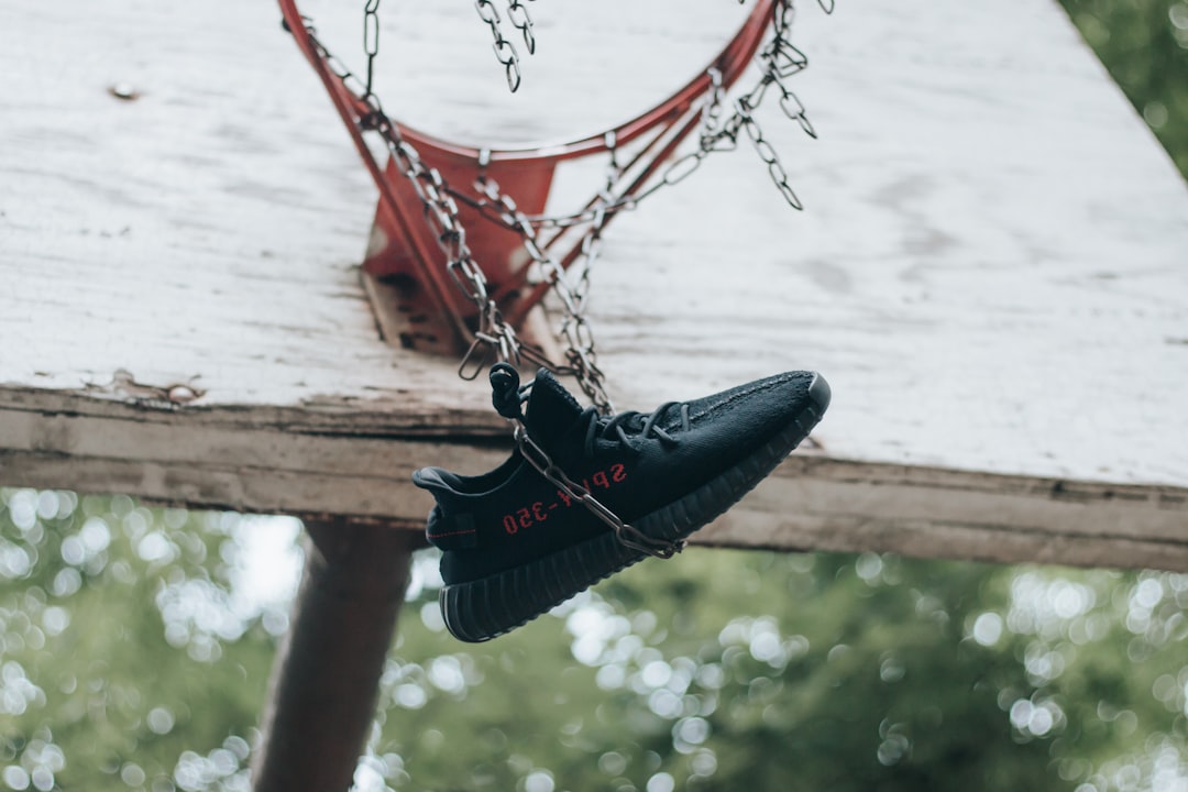 hanged black Adidas Yeezy Boost