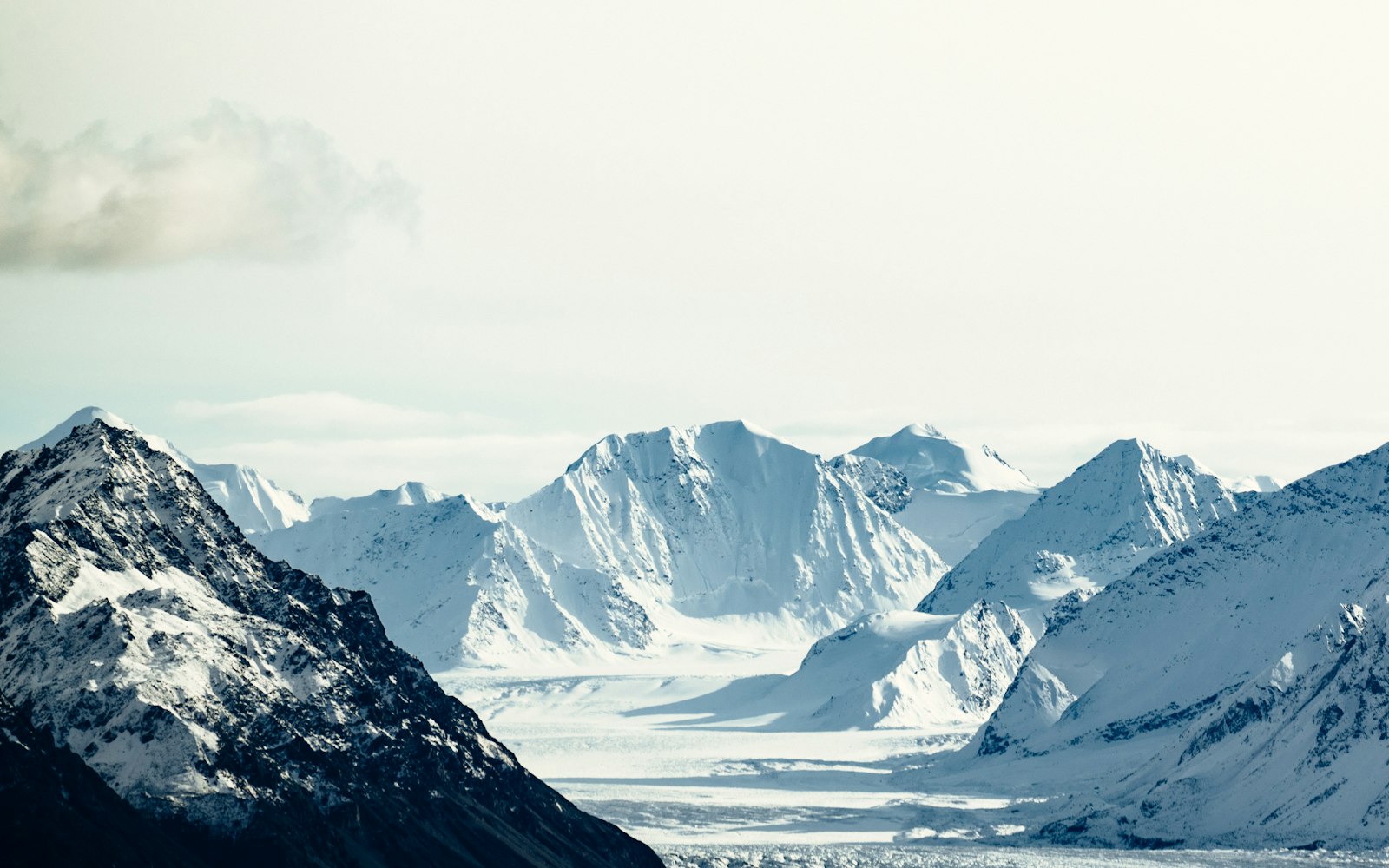 Sony a7R II + Sony FE 70-300mm F4.5-5.6 G OSS sample photo. Mountain covered by snow photography