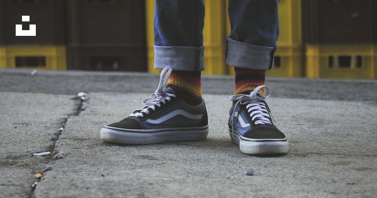Person wearing black Vans Old Skool shoes photo Free Shoe Image
