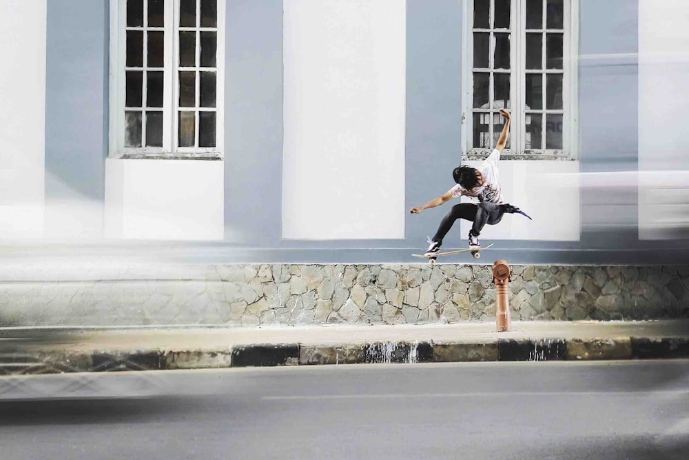 man jumping using skateboard