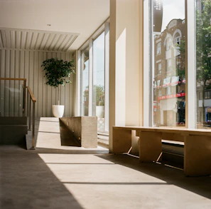 Ramp-up unit with clean white walls and polished concrete floors, bathed in natural light.