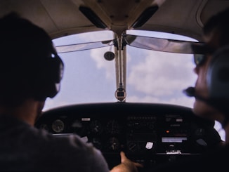 person piloting airplane
