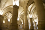Wide-angle shot showing the hall’s polished floors and stylish pillar design.