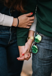 man and woman holding hands