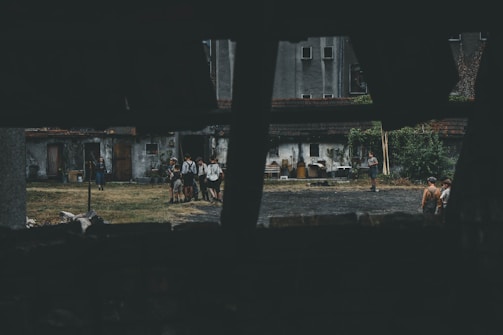 group of people near door during daytime