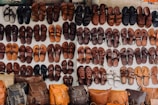 pairs of assorted sandal lot on white textile