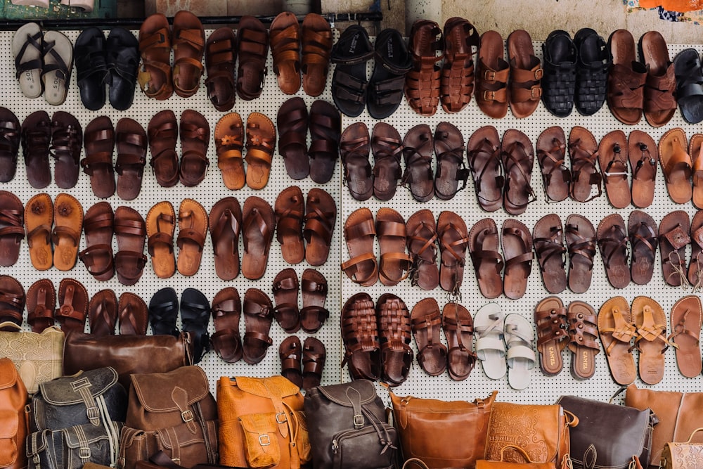 pairs of assorted sandal lot on white textile