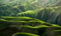 bird's eye view photograph of green mountains