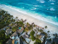 aerial photography of houses near the sea