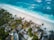 aerial photography of houses near the sea