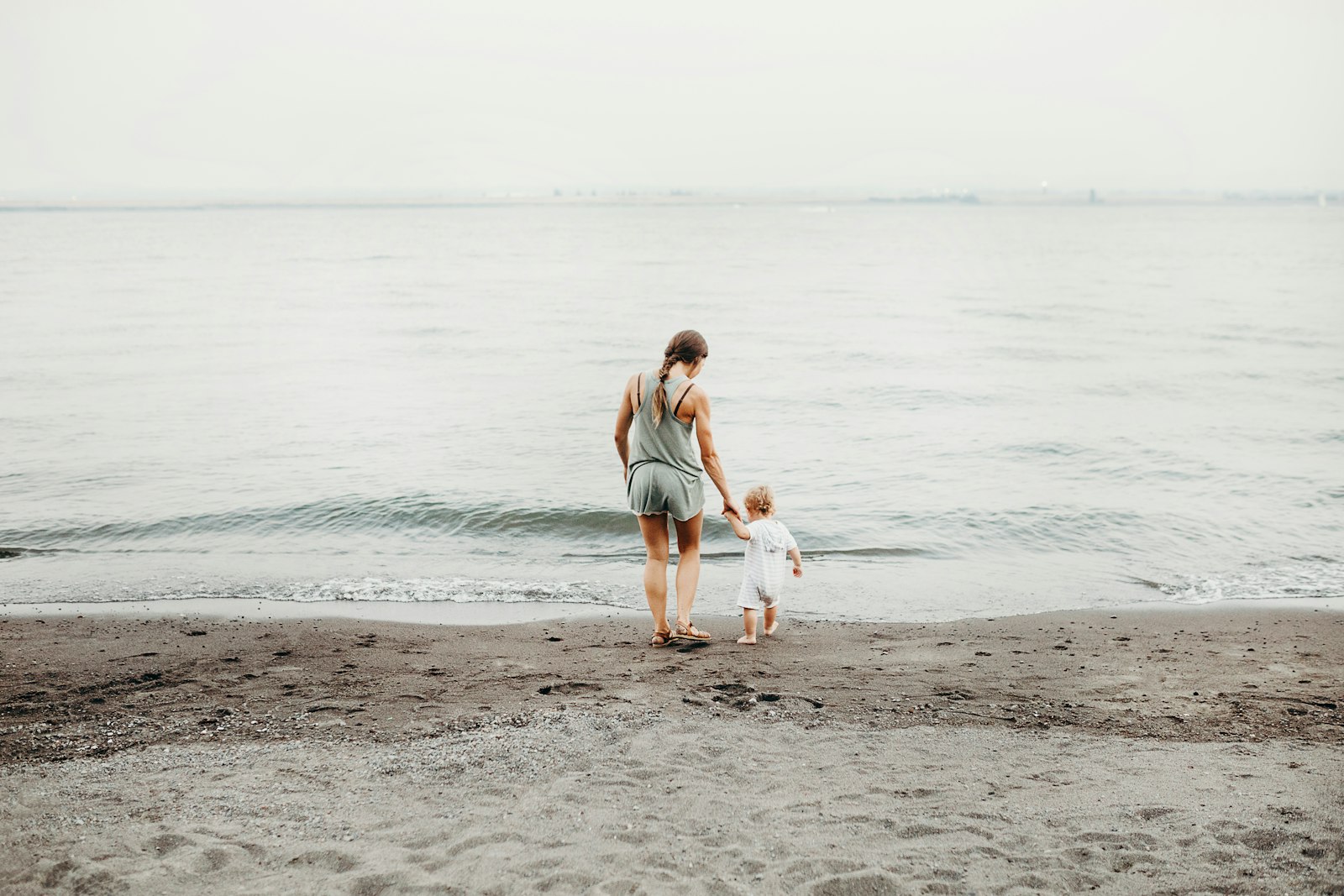 Sigma 35mm F1.4 DG HSM Art sample photo. Woman and baby walking photography