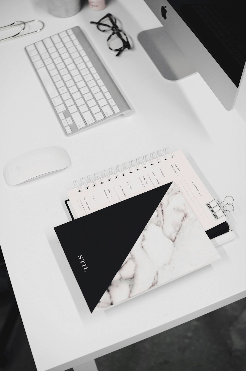 white and black notebook