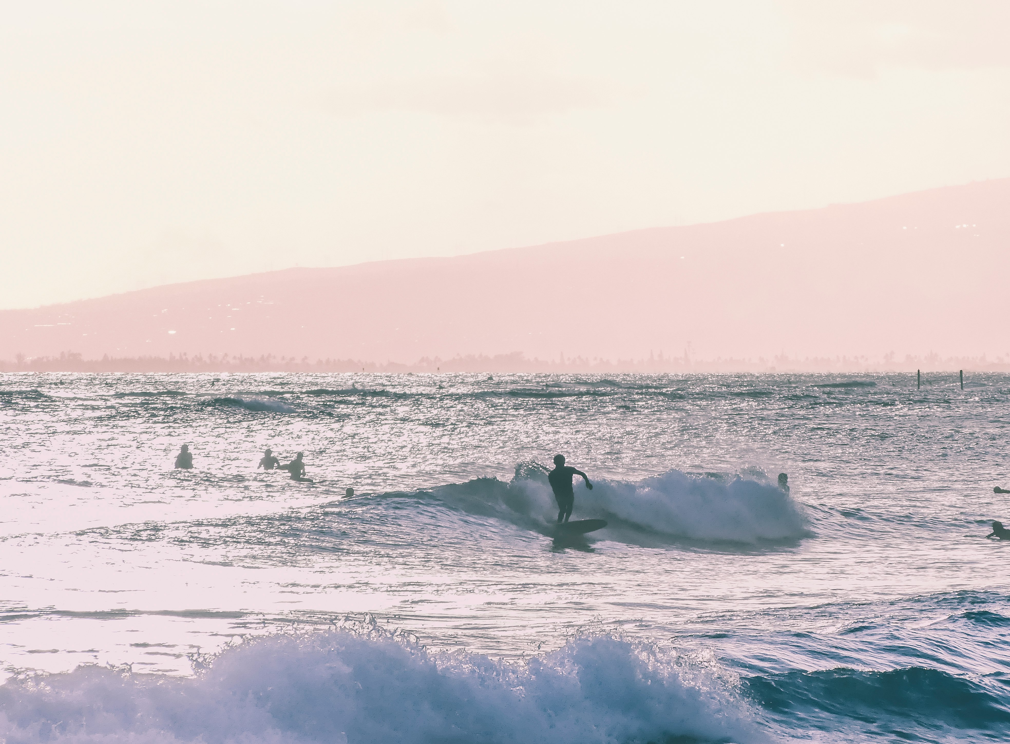 person riding surfboard