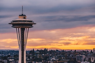 white space needle under black sky