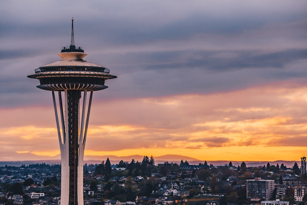 white space needle under black sky