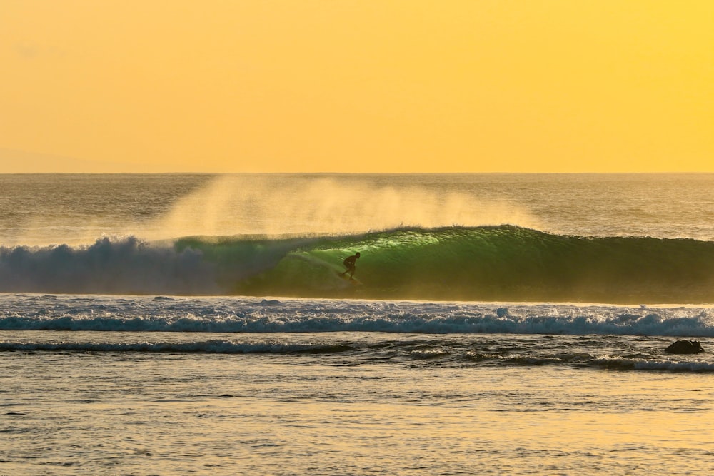 surfer on waves