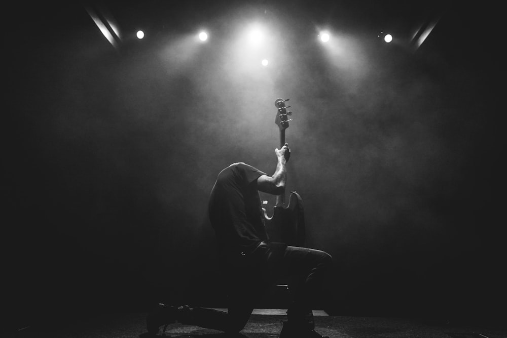 lead guitarist doing guitar show on stage