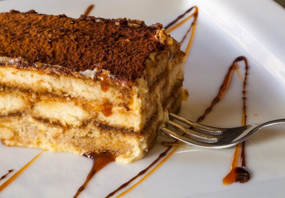 sliced cake on white plate