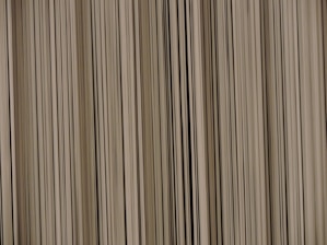 Close-up of a high-resolution barcode printed on a product label with clear lines and sharp edges.