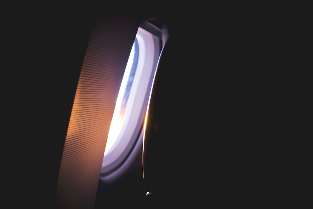 a view of a window from inside an airplane