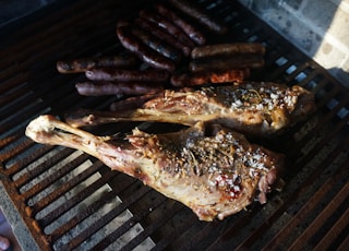 grilled chicken on brown steel griller