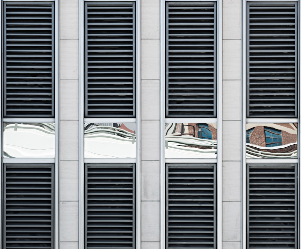 grey and black building closeup photography