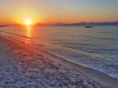 View of the nearby beach along the Bay of Bengal at sunset.