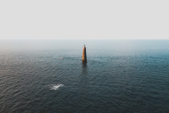 rock monolith surrounded by body of water in Scituate United States