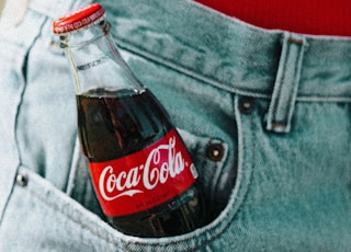 Coca-Cola glass bottle on pocket