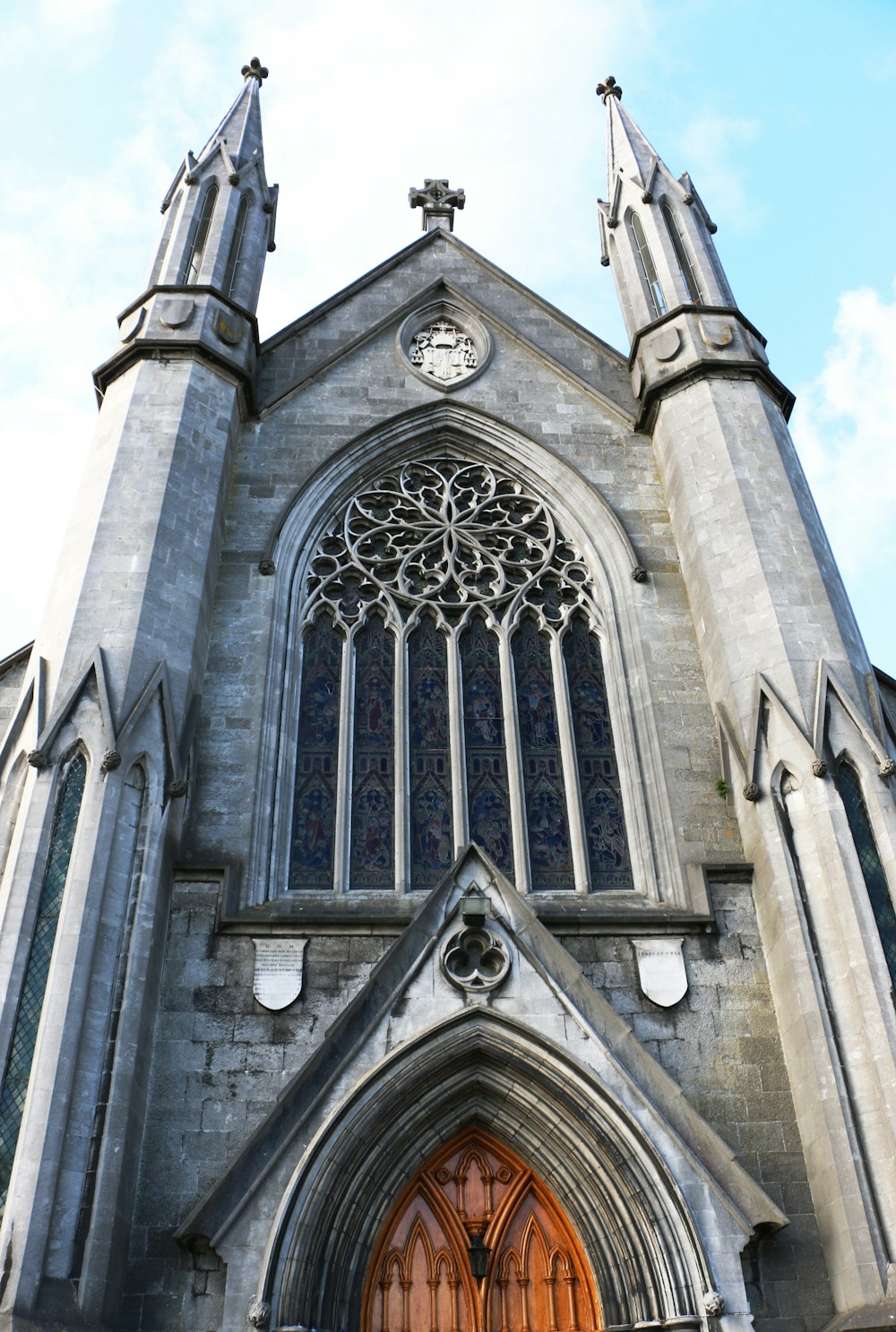 low angle photography of gray concrete cathedral taken at daytime