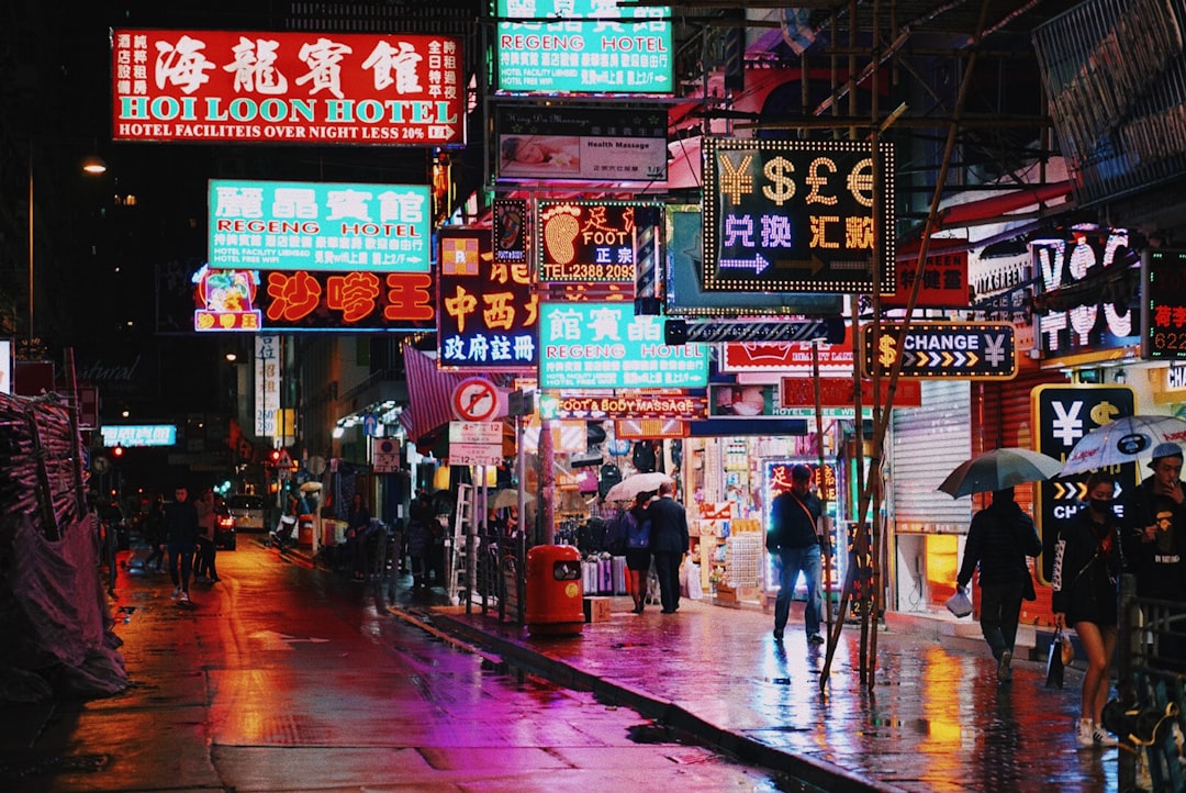 people walking on side of road, Hong Kong neons