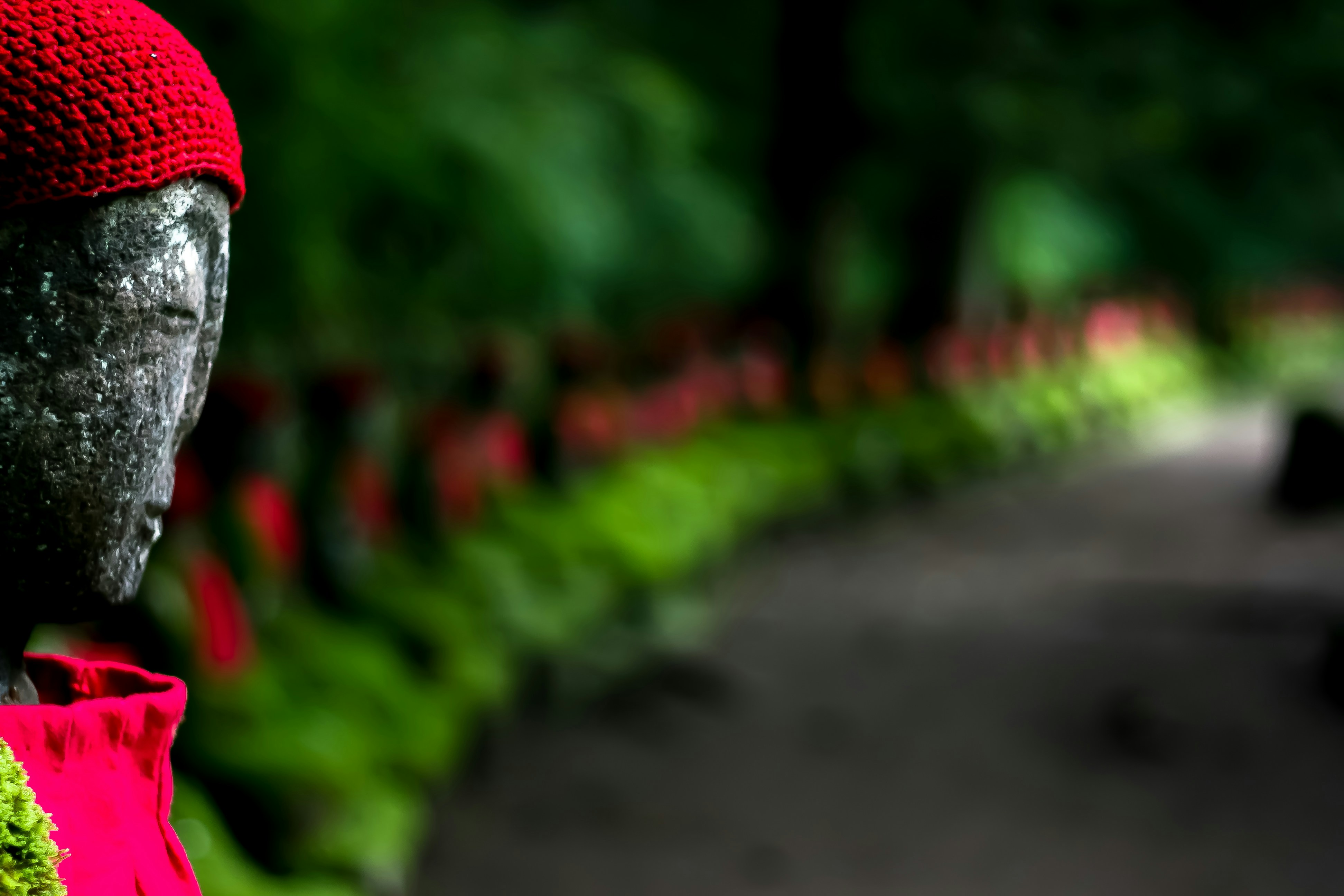 Nikkō is a UNESCO World Heritage site with three large temple and shrine complexes set in a beautiful cedar forest. It is an amazing place, but also amazingly popular replete with packed tourist trains and buses. Having all day to wander I quickly covered the main sites. A bridge on my map at the far side of town called to me for reasons I can’t explain. Upon arriving there I was alone with the river loudly rushing through a gorge. I followed a footpath beside the river and found this simple yet beautiful Buddhist shrine sitting quietly in the forest alongside it.