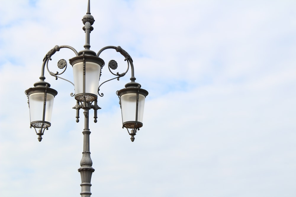 gray metal lamp post