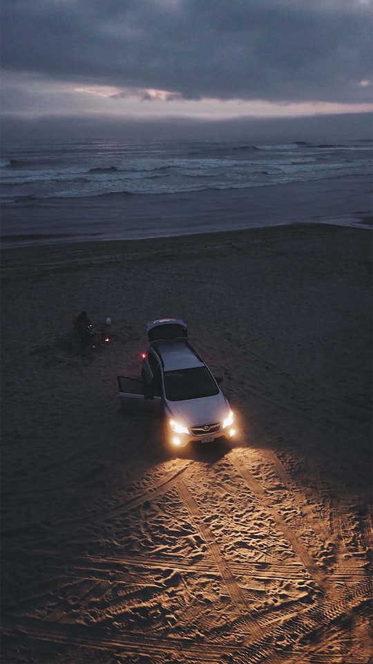 gray vehicle parked near shore line in Tierra Del Mar United States