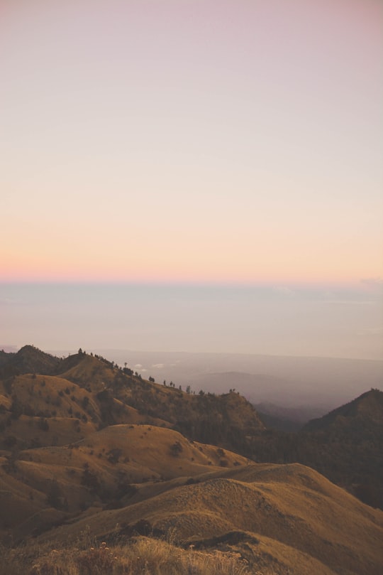 brown mountain and fog landscape long exposure photography in Mount Rinjani Indonesia