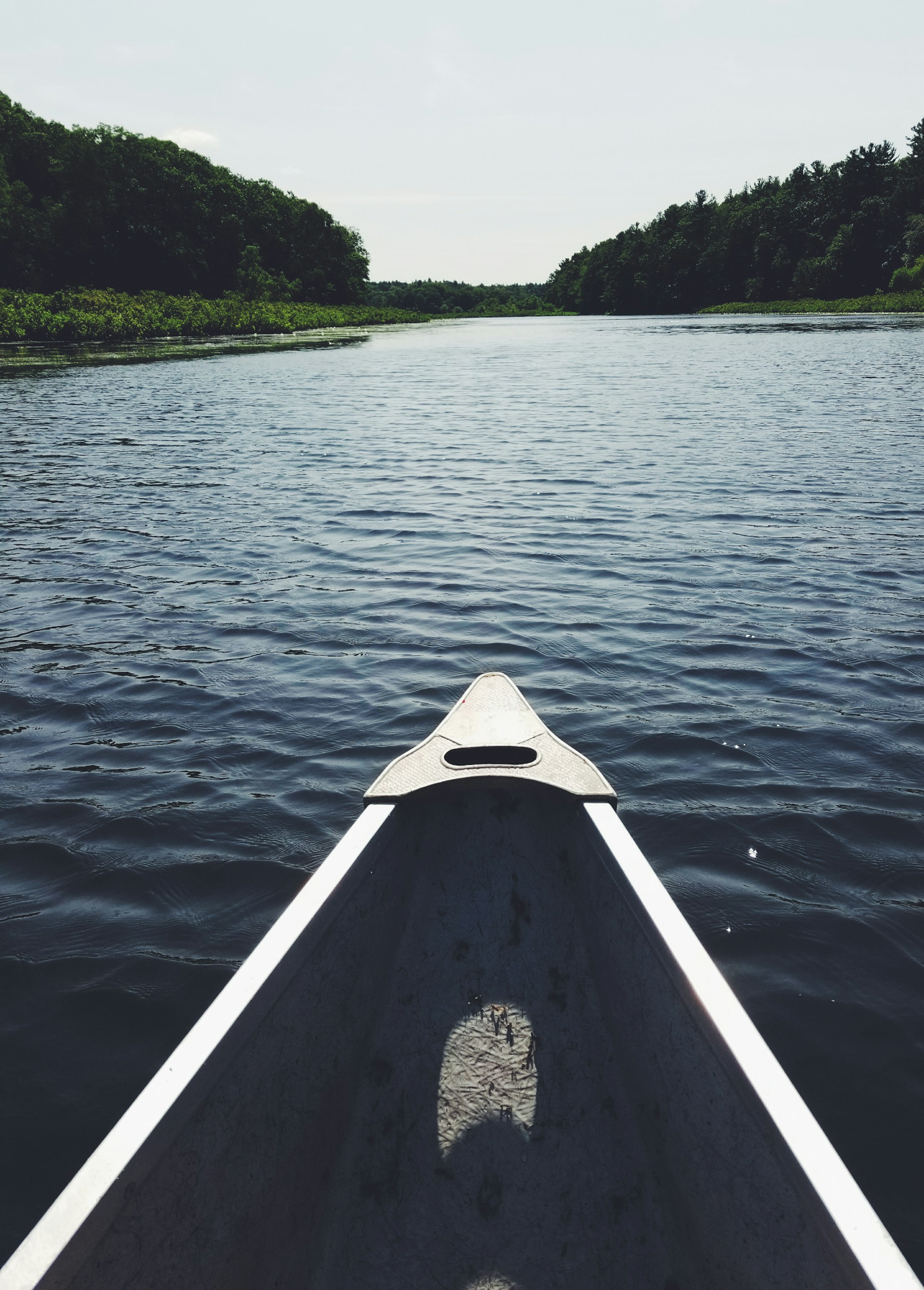 woman wearing yellow long-sleeved dress under white clouds and blue sky during daytime