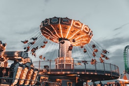 people riding amusement park ride