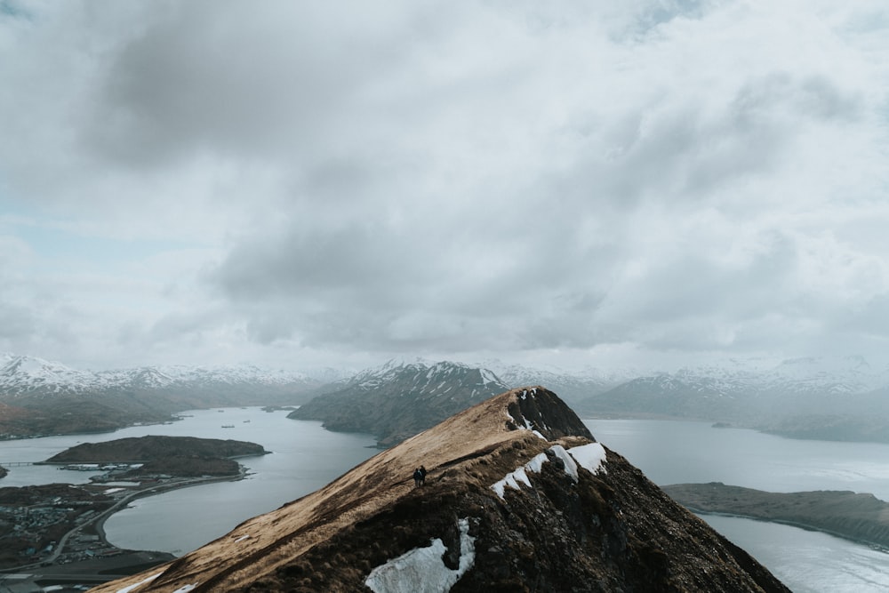 mountain under cloudy sky during daytime