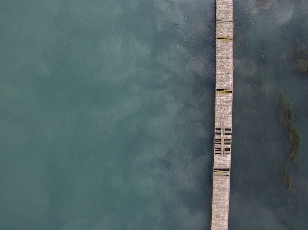 brown wooden ocean dock