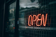 An artistic open sign illuminated, perfect for business displays.
