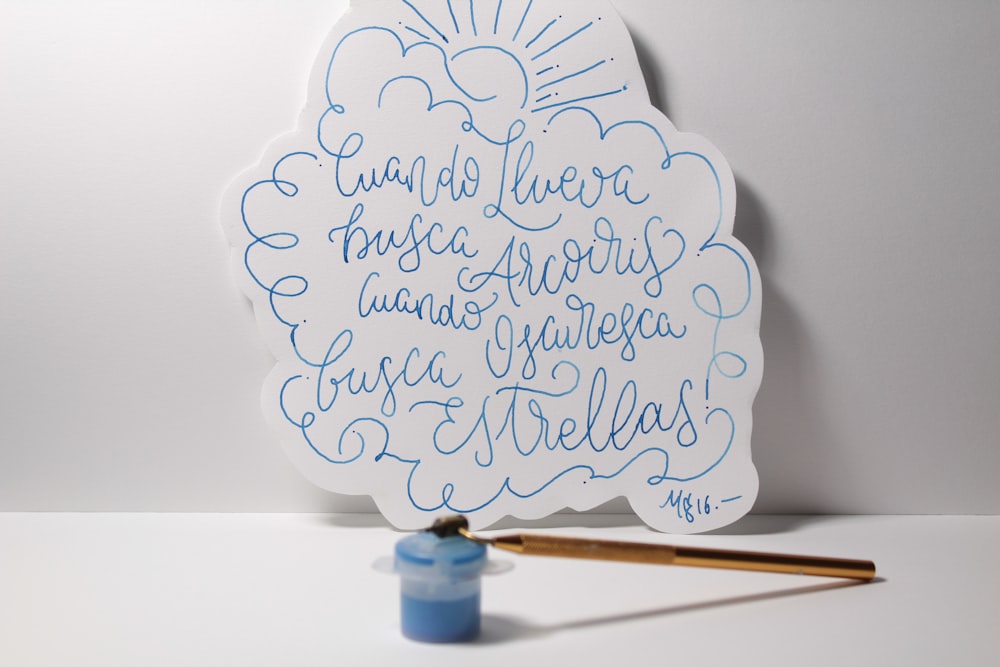 white and blue text wall decor