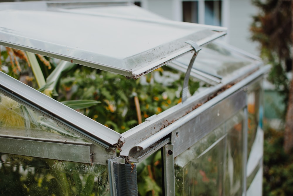 gray metal framed glass window opened during daytime