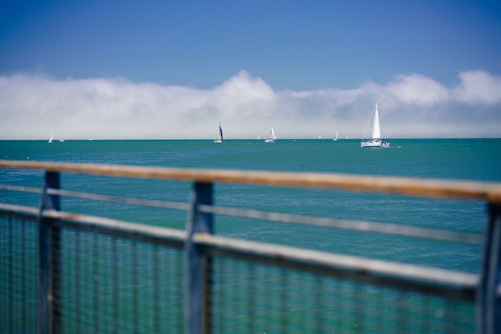 sailboats on seat under blue sky