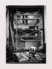 Photo of Aline Peixinho, civil engineer, reviewing concrete construction plans on site.