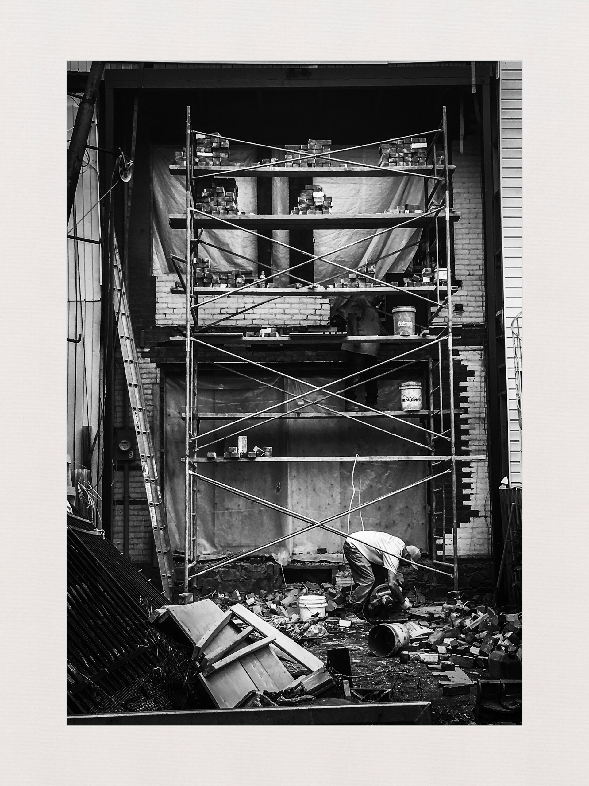 black and brown leather padded tub sofa