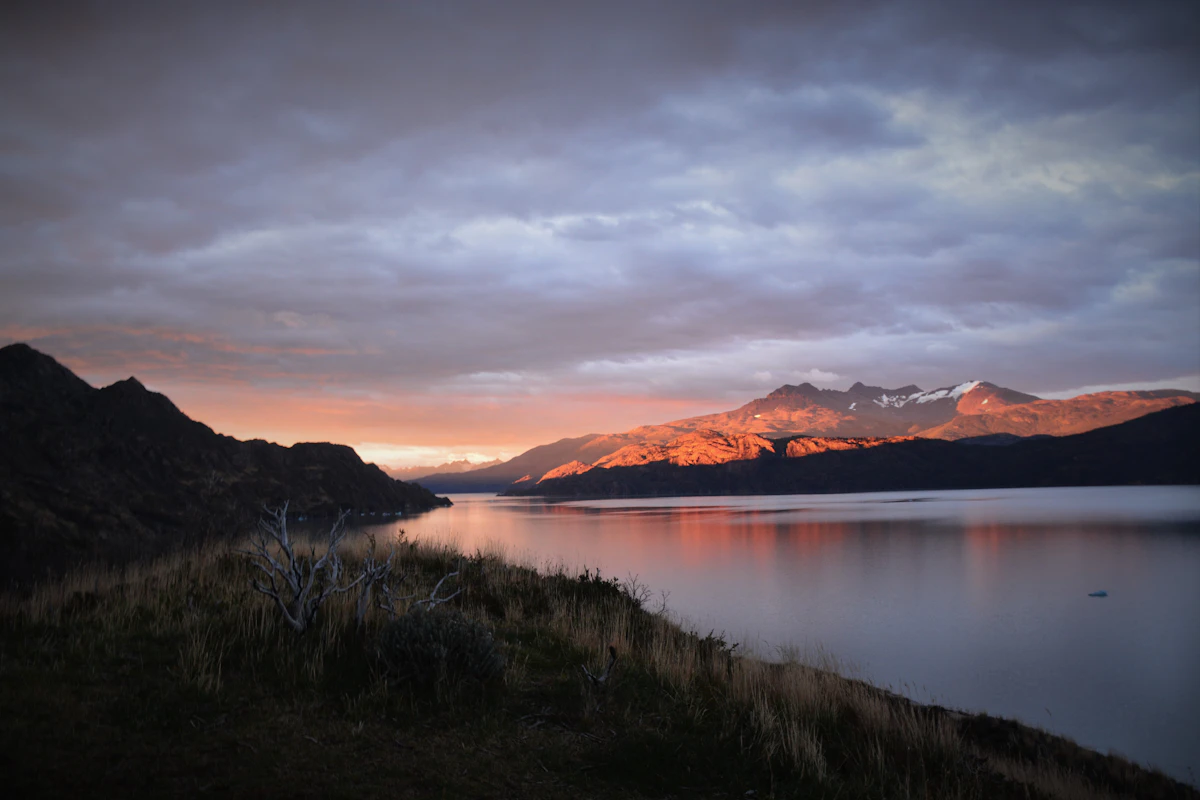 Sweeping Patagonian landscape with turquoise glacial lakes and snow-capped mountains Torres del Paine Chile