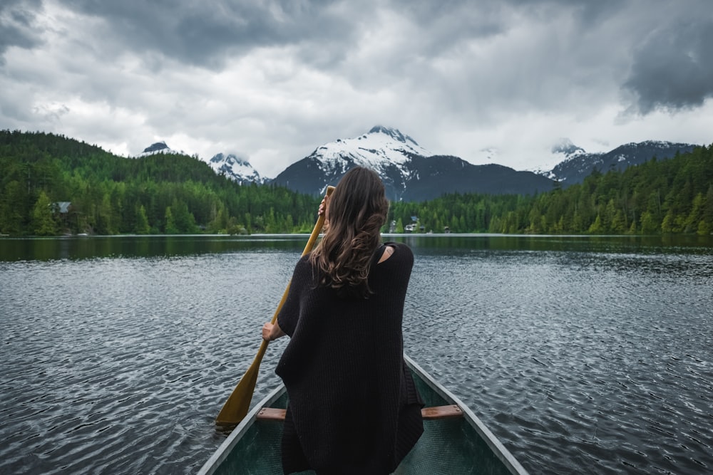 woman riding boat sailing