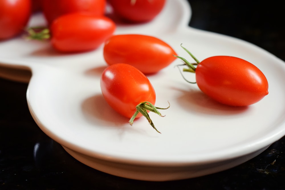 cherry tomatoes on white plate