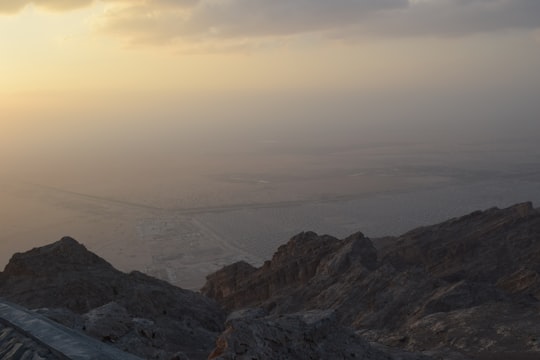 rocky mountains during daytime in Jebel Hafeet United Arab Emirates