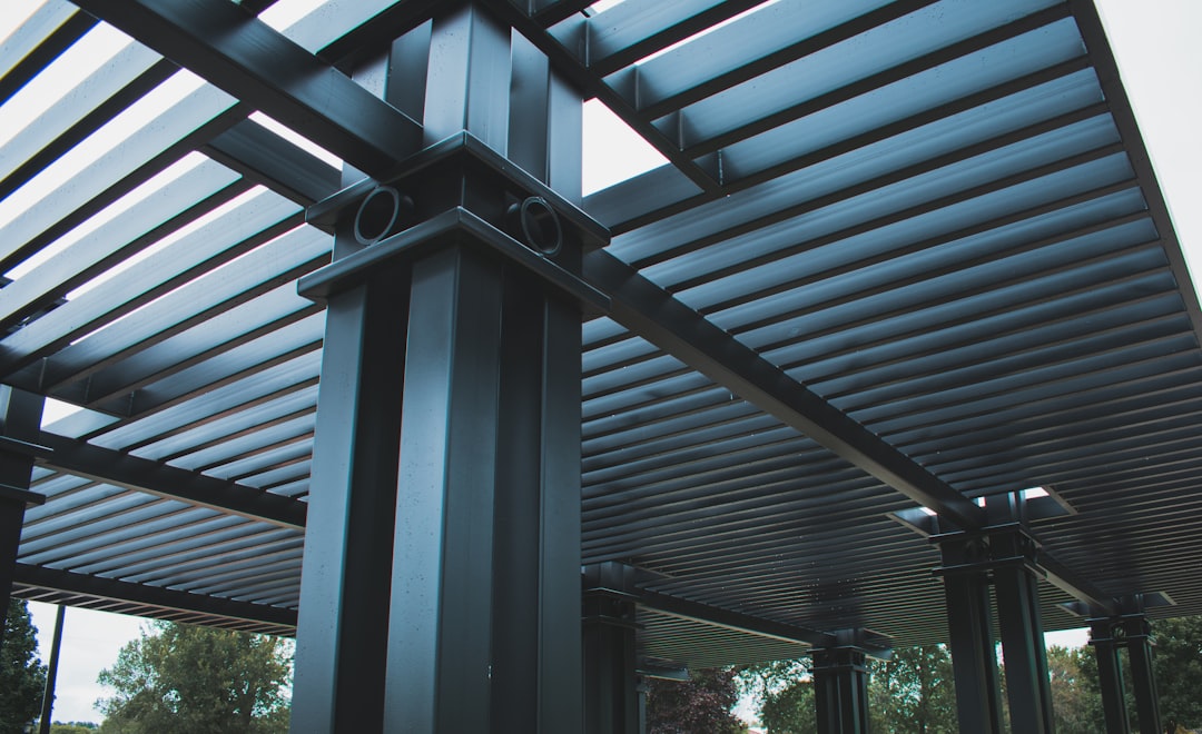 gray concrete pillars, Into different parallels.